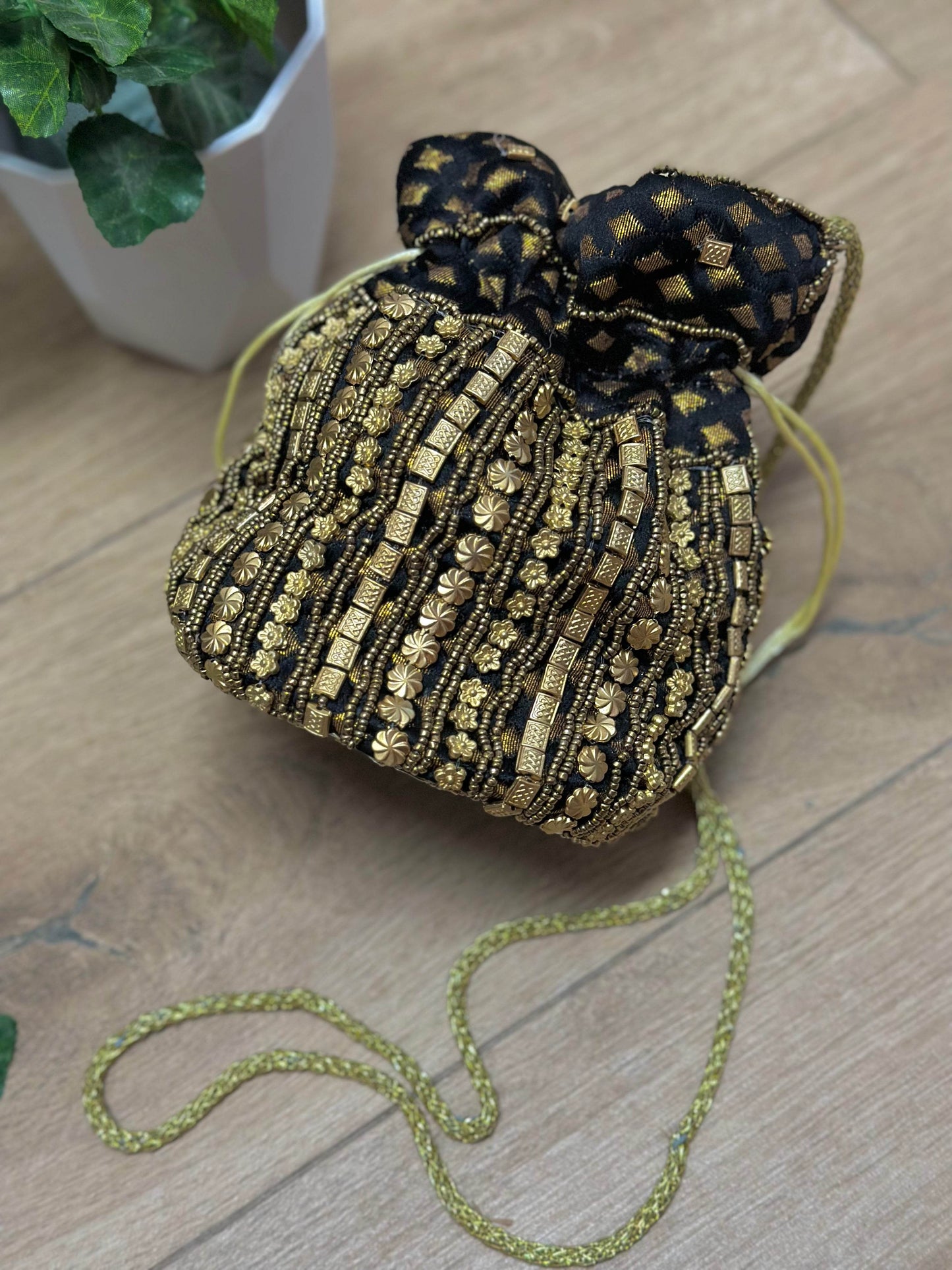BOMBONERA DORADO/NEGRO - hemeloshop