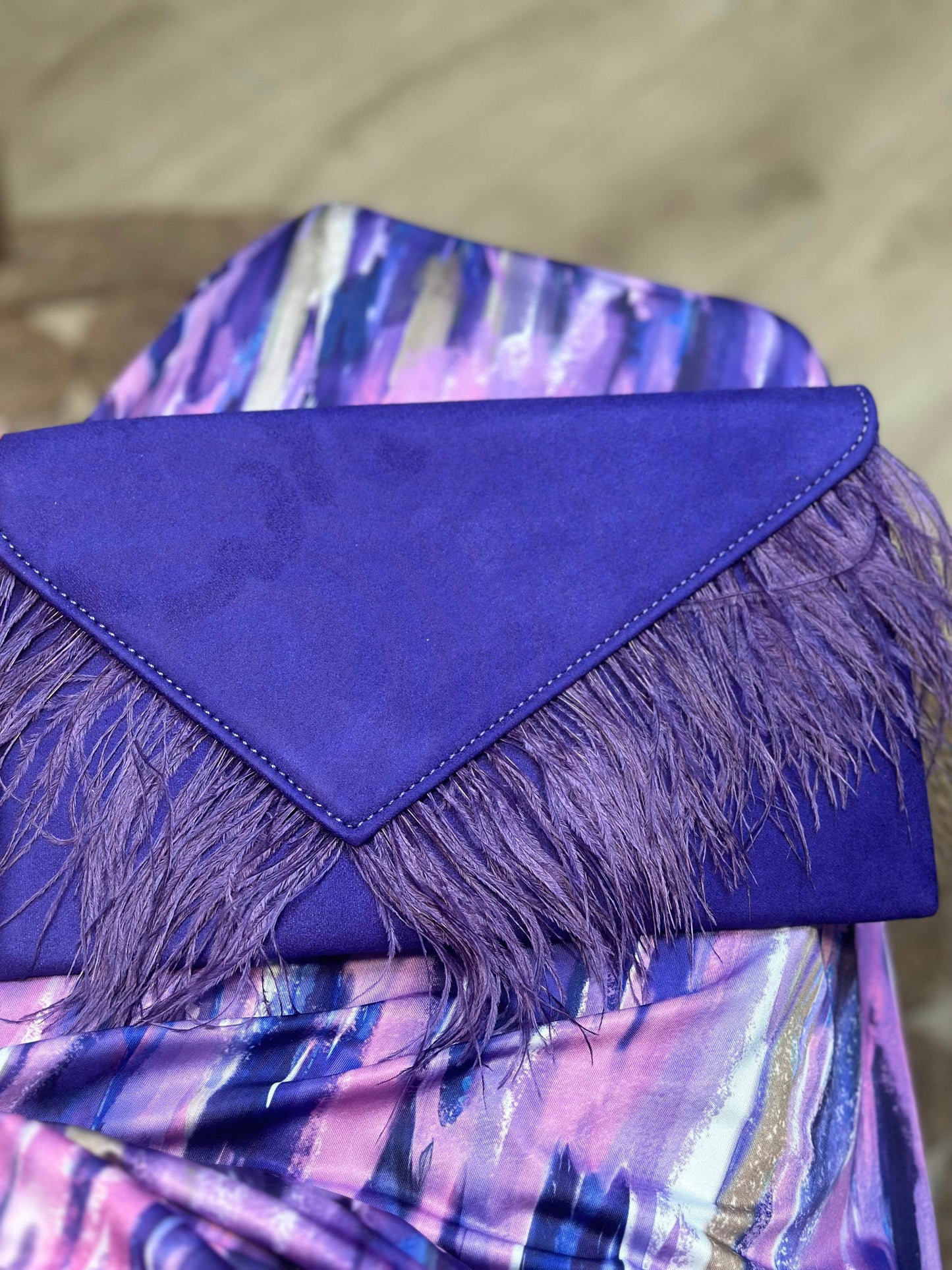 BOLSO PLUMI MORADO - hemeloshop